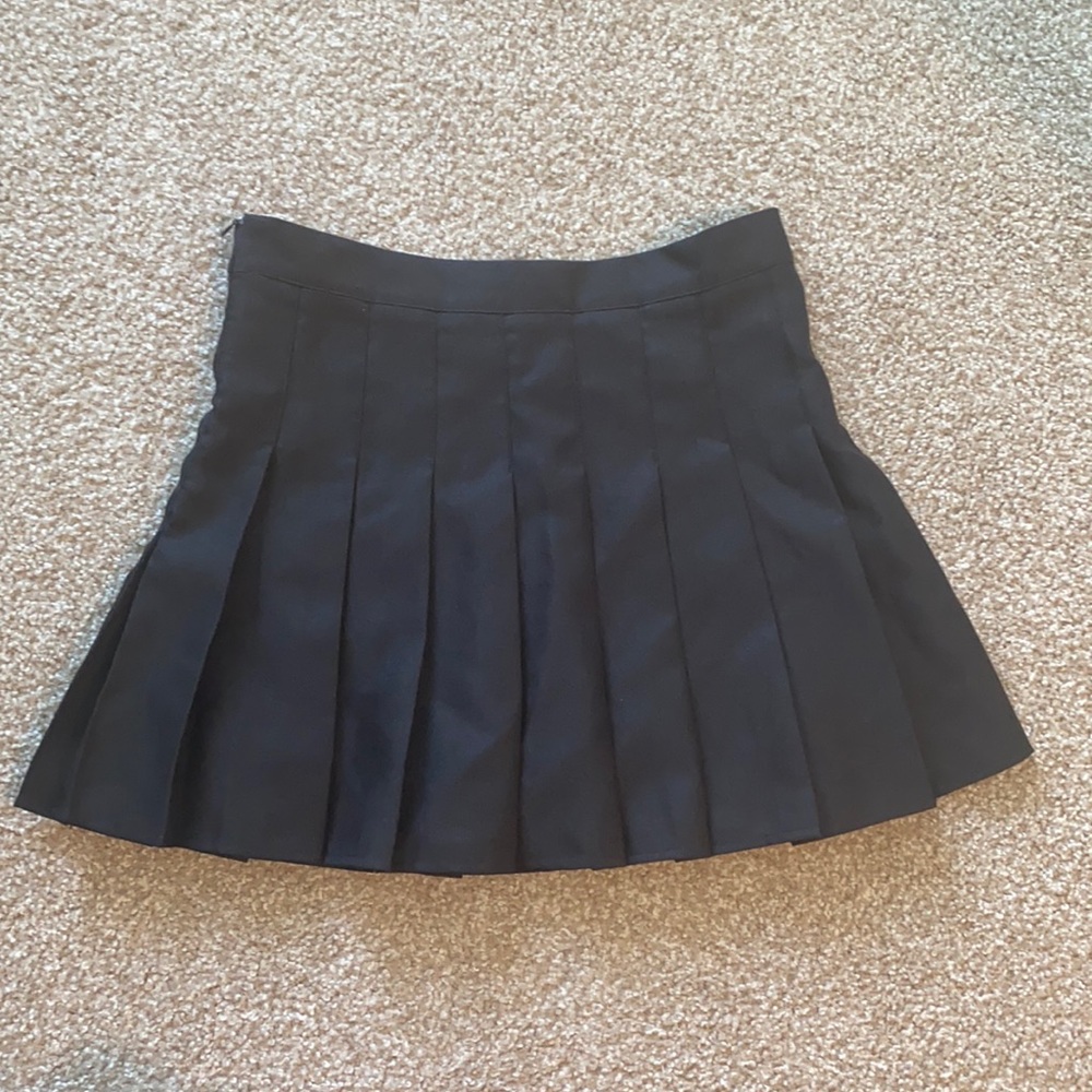 black pleated skirt